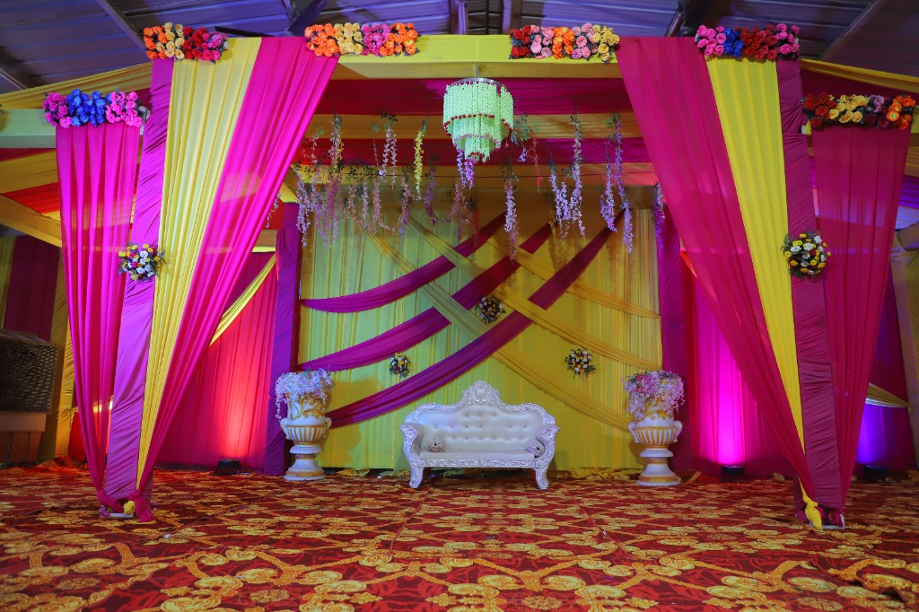 Mohan Vatika Royal Wedding Stage with Floral Backdrop and Sofa
